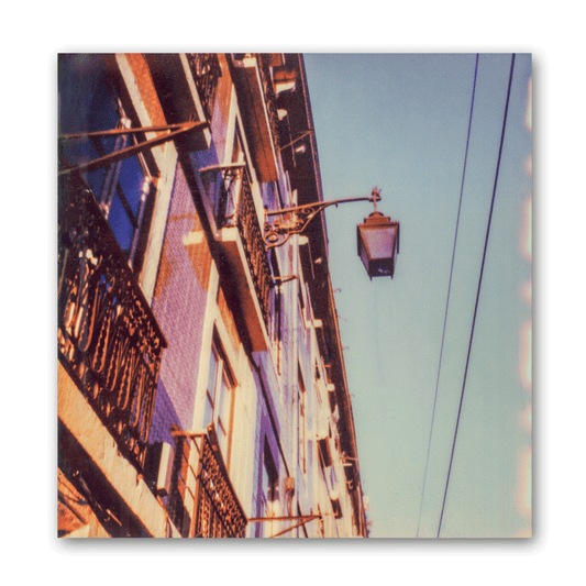 Polaroid von einer Häuserfassade in Portugal mit den typischen Azulejo-Kacheln
